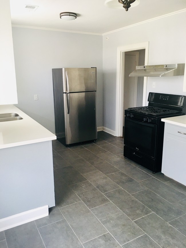 Spacious Kitchen w/new tile flooring - 2001 Center St