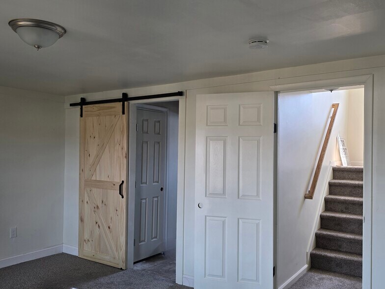 Basement- could be a 3rd bedroom or extra living area - 1718 Judy Way