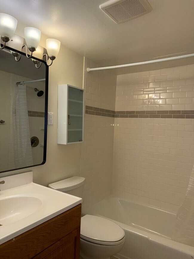 Building Photo - Commuter’s Dream! Large 2BR/2BA Condo Steps from Metro – All Utilities Included!