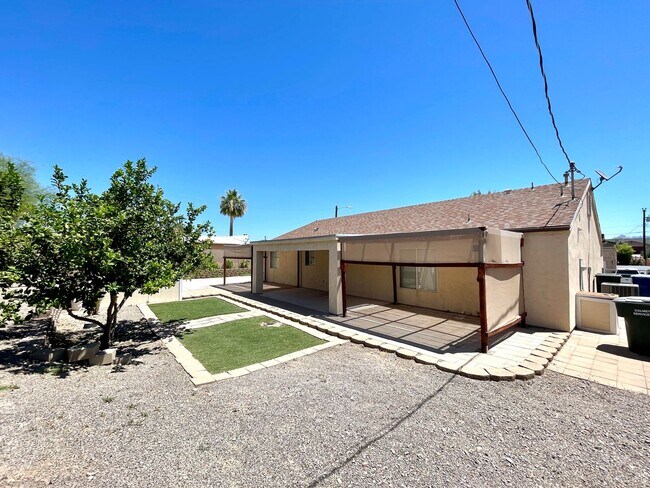 Building Photo - Inviting 3 Bedroom Home with RV Parking an...