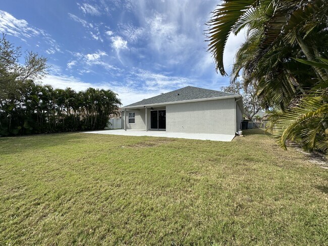 Building Photo - Spacious 4-Bedroom Home in Melbourne, FL w...