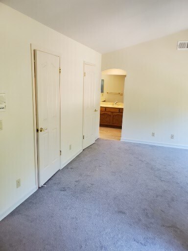 Primary bedroom space, 2 separate closet doors - 2040 Goldenrod Ln