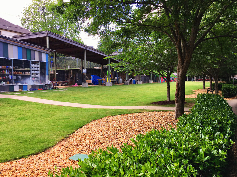 Neighbors mingle and pups frolic in the shared greenspace. - 659 Auburn Ave NE #145