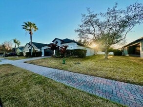 Building Photo - Lake Nona!! Spectacular 4X2 in Gated Nona Crest! All tile flooring!! 2 car garage! Move in April ...