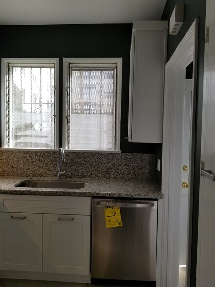STAINLESS SINK AND DISPOSAL - 6328 Orange St