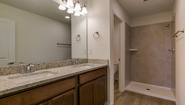 Building Photo - New ST FE Town Home