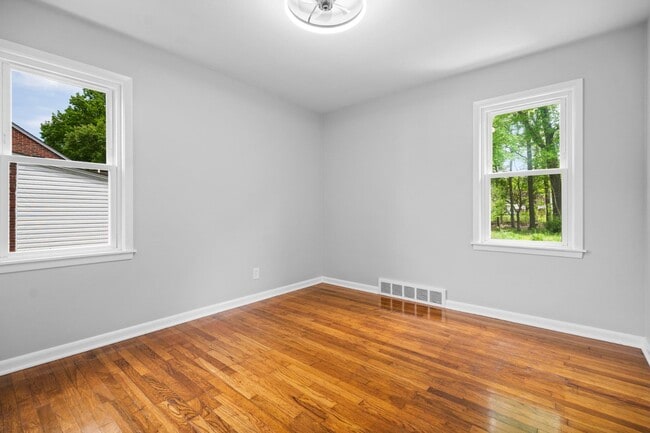 Building Photo - Freshly Remodeled 3-Bedroom Cape Cod in The Heart of Richmond Heights