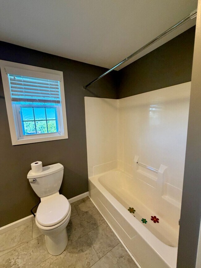 Building Photo - Modern Comforts Await: Spacious Rental with 2-Car Garage, Private Office, and Finished Basement w...