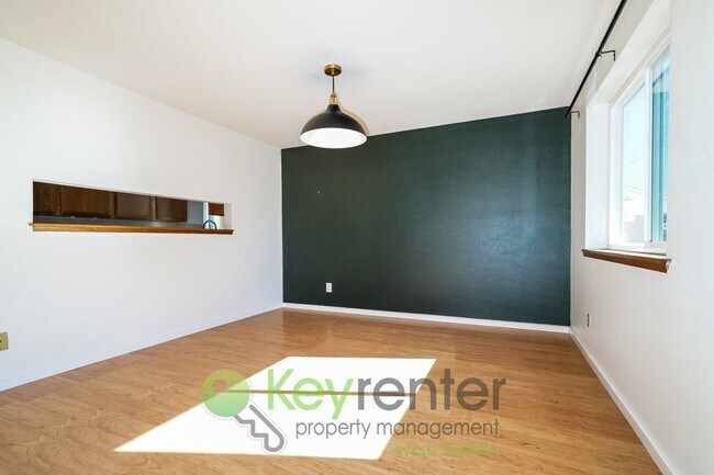 Building Photo - Remodeled Two-Bedroom with Open Floor Plan...