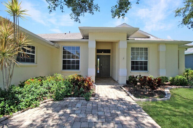 Building Photo - Annual rental: Spacious 3BR/2BA Creekwood Home with Office, Screened Lanai, EV Charger & Resort-S...