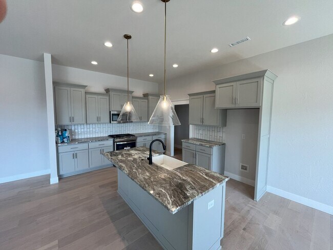 Building Photo - Nearly-new 4-bedroom, 2-bath home in the exclusive Lion's Gate Neighborhood!!!
