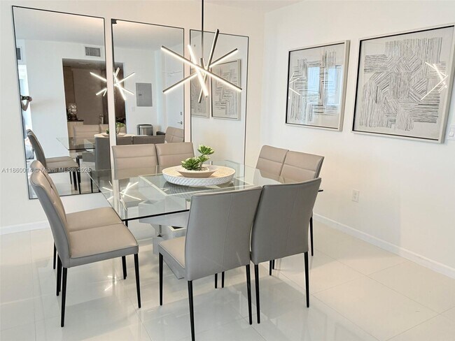 Building Photo - 10275 Collins Ave