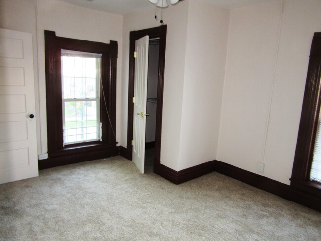 one of two second floor bedrooms - 105 W Vine St