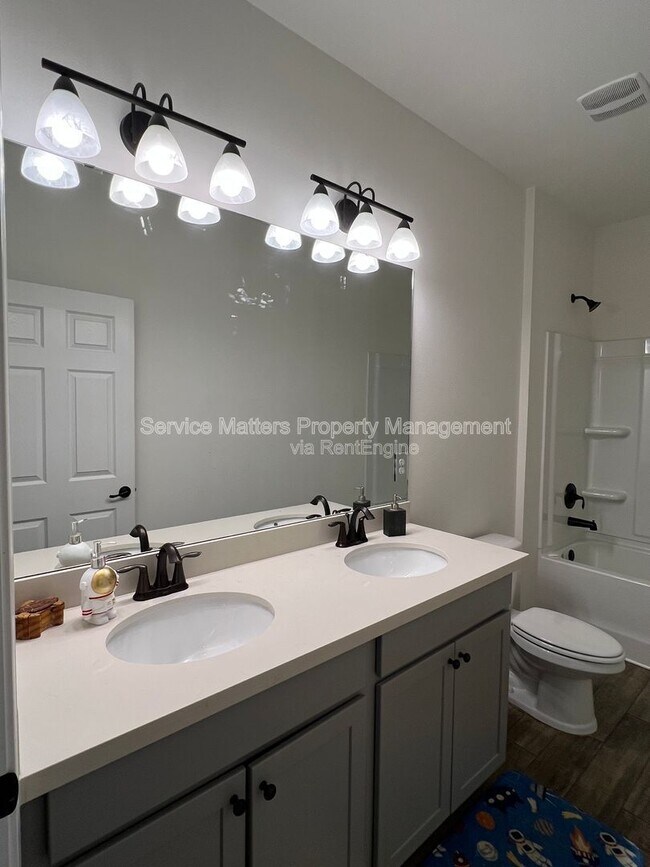 Building Photo - 4130 Lazy Breeze Ln