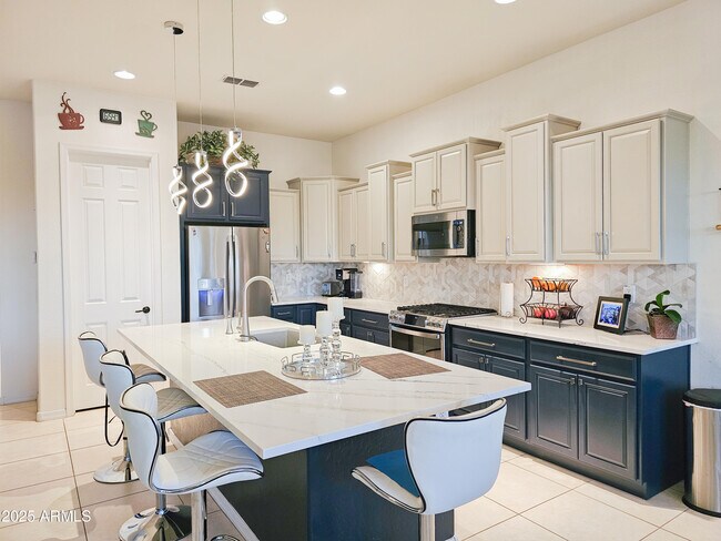 Building Photo - 5947 E Sienna Bouquet Pl