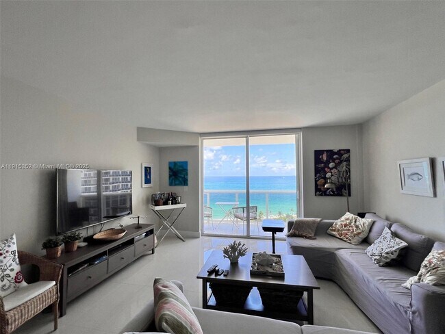 Building Photo - 10275 Collins Ave