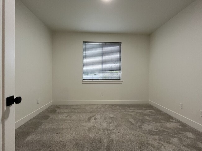 Building Photo - Modern 2-Bed, 1.5-Bath Condo with Custom Kitchen, Private Patio, and Prime Location