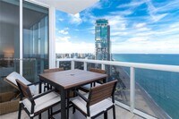 Building Photo - 18201 Collins Ave