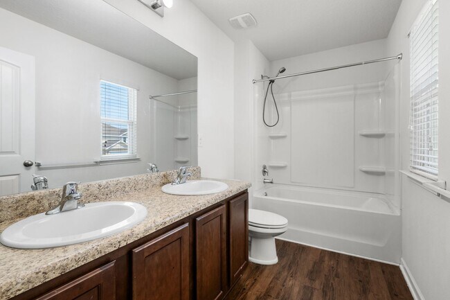 Building Photo - OPEN CONCEPT 4 BED / 2.5 BATH - Community Pool