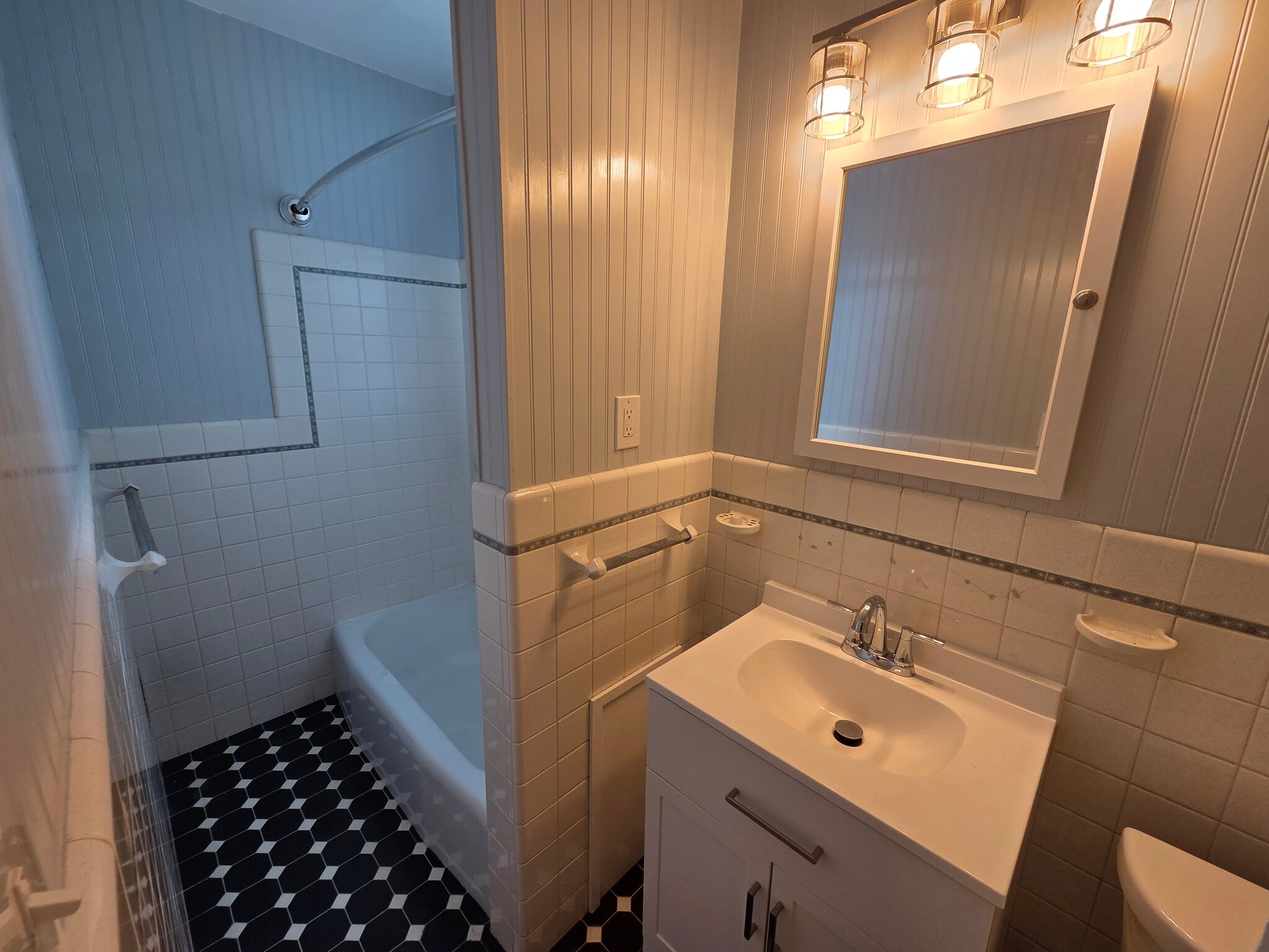 Bathroom with tub and shower - 146 E 2nd St