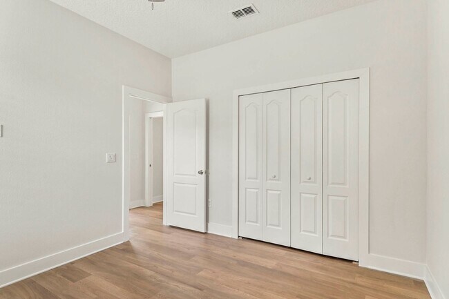 Building Photo - Expansive 4 bedroom, 3 bath remodeled home in gated community