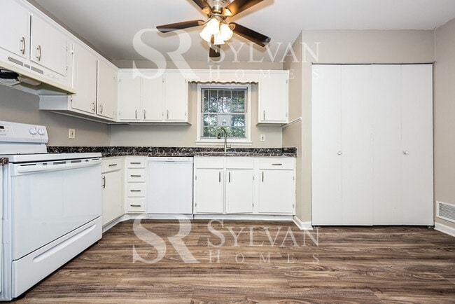 Building Photo - Turn the key. Enter. Smile. Repeat every day!