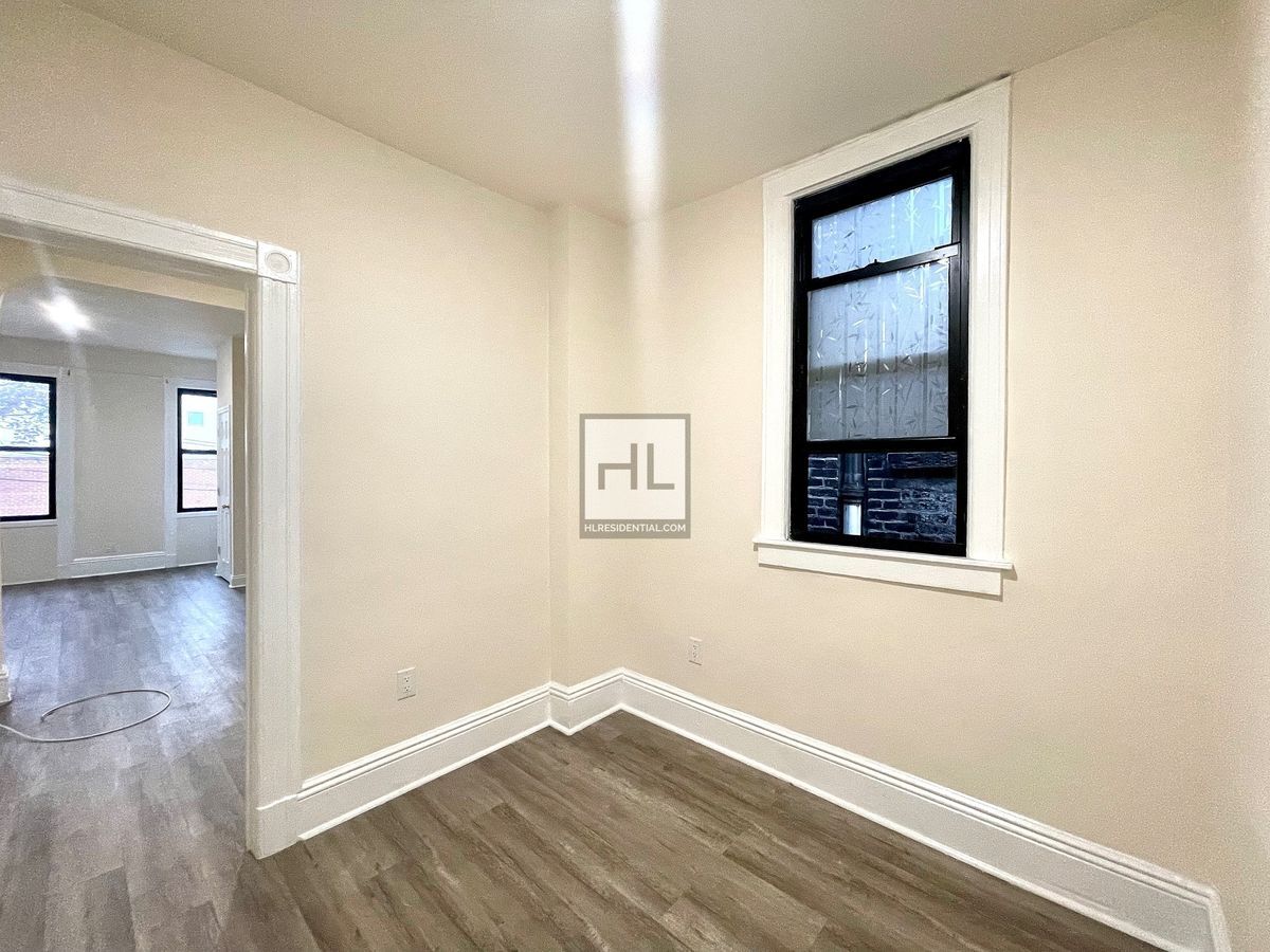 Building Photo - 51-28-51-35 35th St