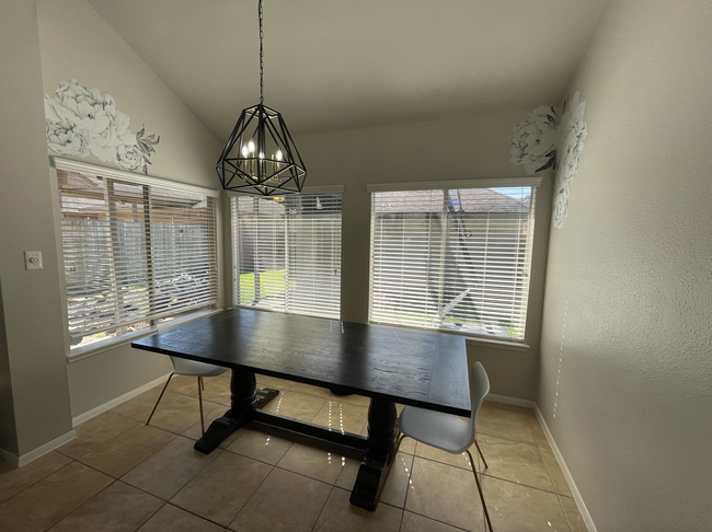 View of the Dining Room from the Kitchen - 6633 Queensclub Dr