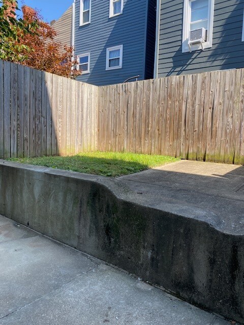 Private patio and yard - 5234 Holmes St