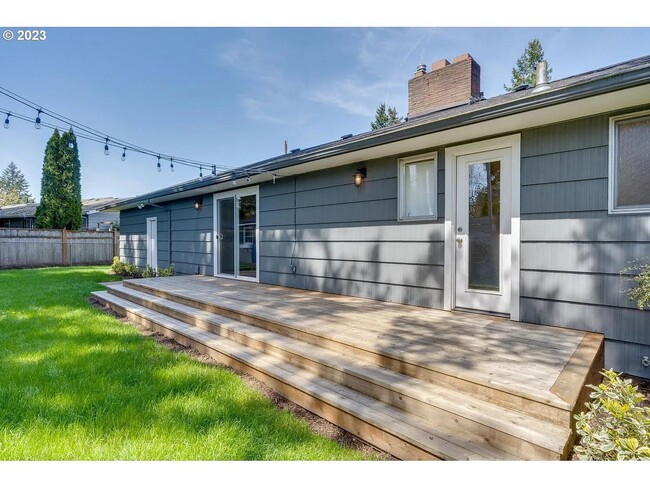 Building Photo - Stylishly Updated Mid-Century Gem on a Qui...