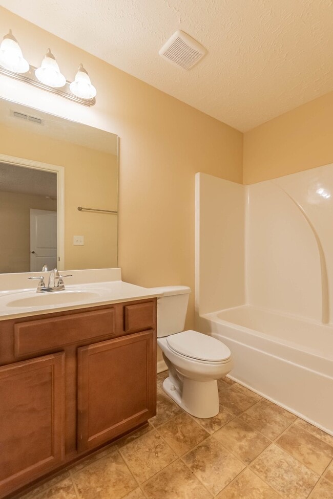 Building Photo - Available Now! Wonderfull Location! 2/2.5 Townhome w/ Upgrades.