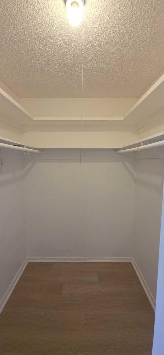 Building Photo - First-floor condo with fenced in backyard!