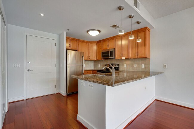 Building Photo - Sun-Drenched 1BR Condo with Rooftop Pool & Parking in Heart of Ballston