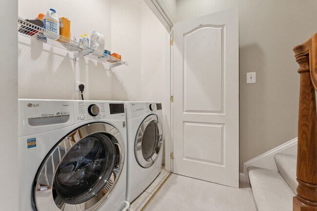 Building Photo - Discover this stunning four-level townhous...