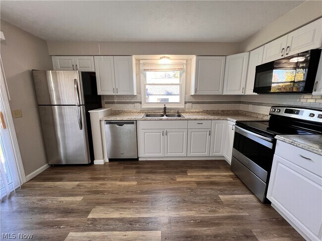 Building Photo - 5155 Portage St NW