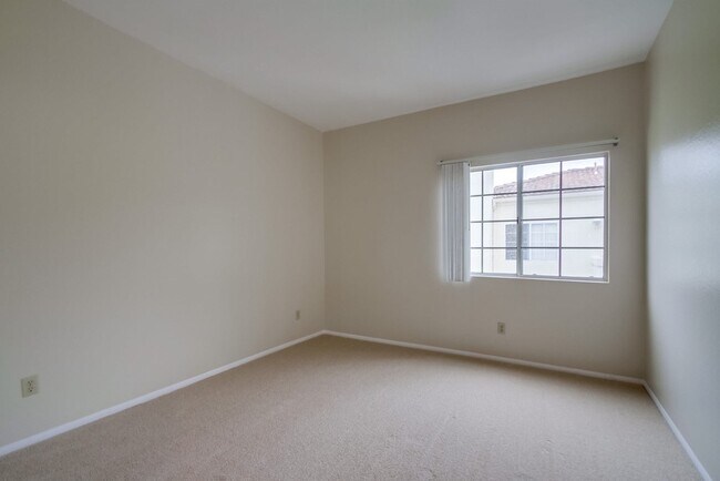 Building Photo - Spacious Townhome in San Marcos, 2-Car Garage, and a Tropical Community Pool!!