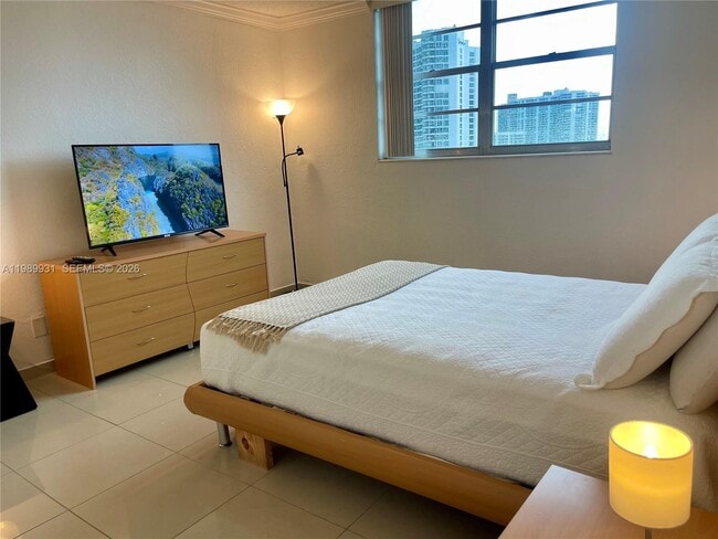 Building Photo - 19390 Collins Ave