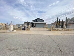 Building Photo - Spacious 4 Bed/3 Bath Refrig A/C Home