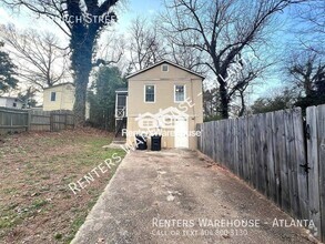 Building Photo - Charming 1-Bedroom Carriage House Near Dow...