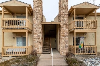 Building Photo - Cozy 2-Bed Condo with Fireplace, Garage & Pool Access Near Shopping!