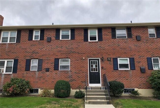 Entrance from parking lot. - 70 Carroll Ave