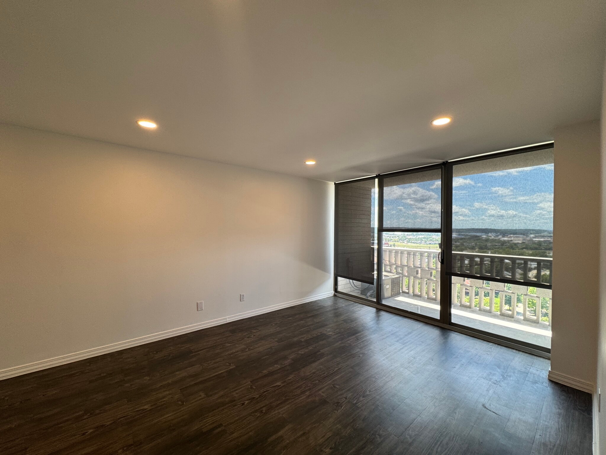 Living room with updated dimmable LED lighting. - 1502 S Boulder Ave