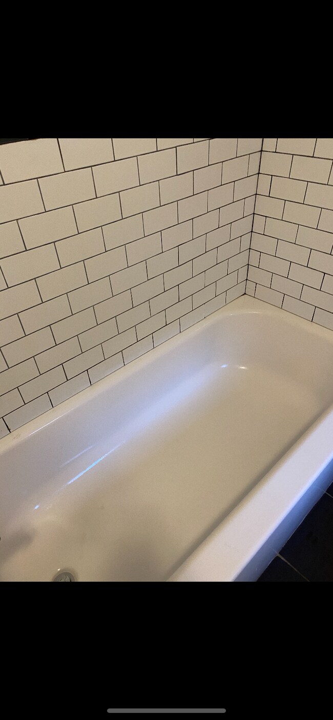 1st Fl bathrm tub - 603 N 32nd St