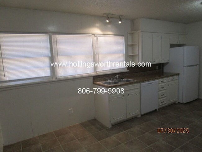 Building Photo - 4 bedroom, 2 bath, 2 car garage with shop ...