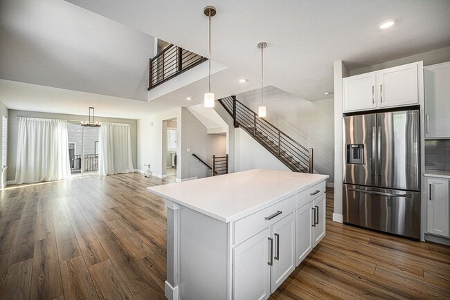 Building Photo - Modern 3-Story End Unit with Designer Fini...