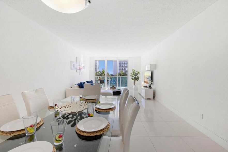 Building Photo - 19370 Collins Ave