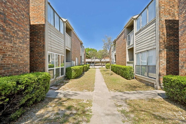 Building Photo - Spacious Dallas Condo with Unbeatable Storage, Private Patio & Carport