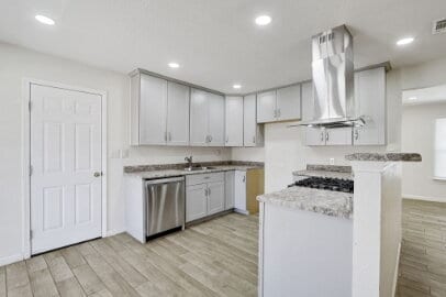 Building Photo - Single story corner home features 3 beds, 2 bathrooms
