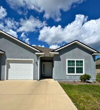 Building Photo - 3/2 Close to base with landscaping included!