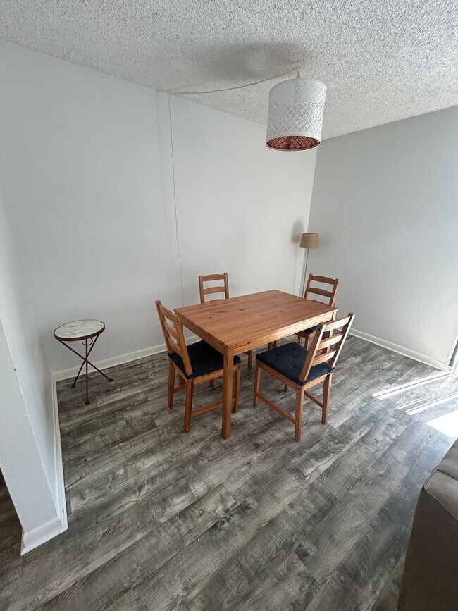 Building Photo - Now Leasing: 1-bedroom and 1.5 bath condo ...